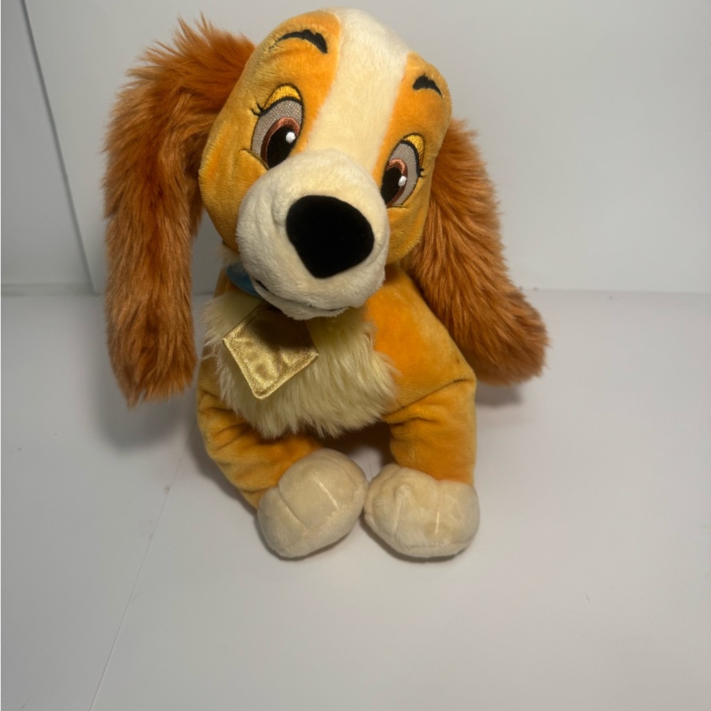 Disney Plush Toy with Orange and Cream Colors